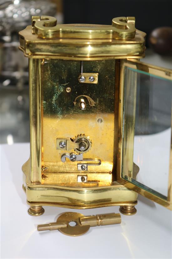 A brass carriage timepiece by Rosen and Co Calcutta height 12cm